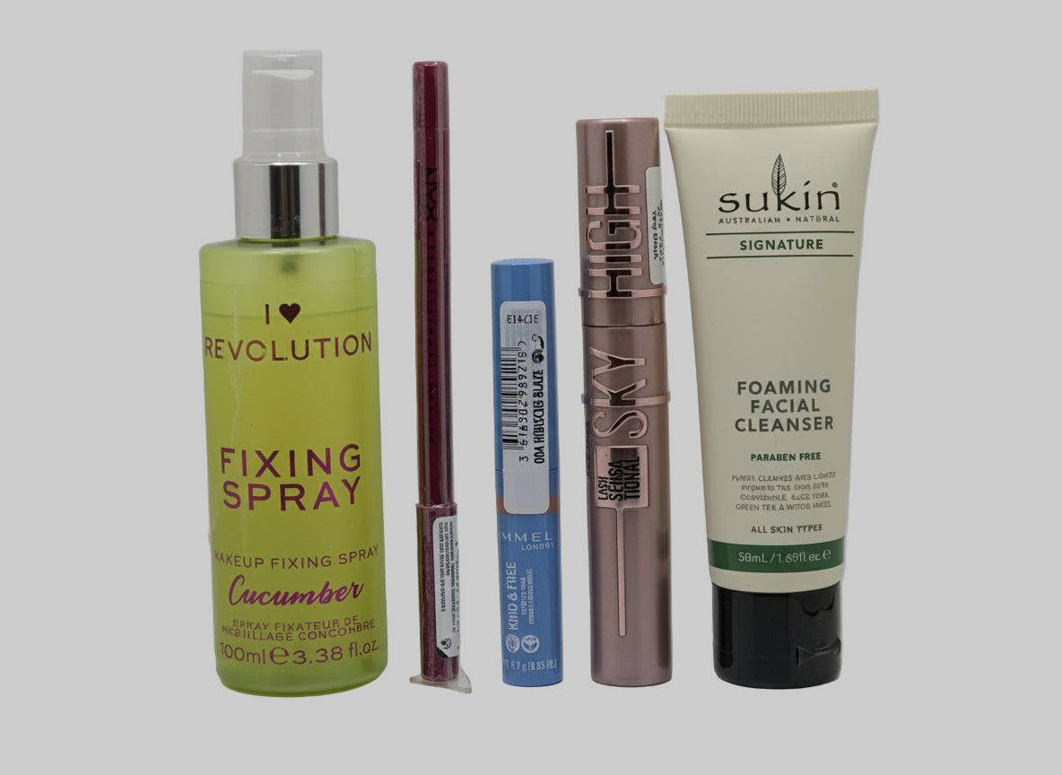 Collection of makeup and skincare products on a white background