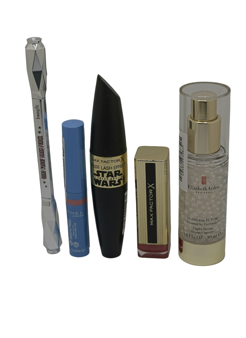 Collection of makeup products including a brush, lip balm, mascara, lip gloss, and perfume on a gray background