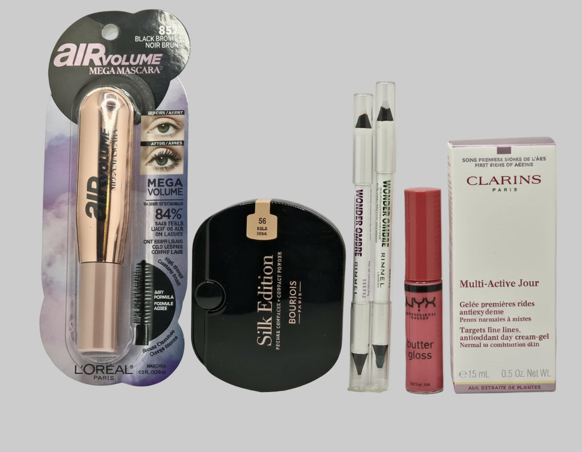 Collection of makeup products including mascara, powder, and lip products on a white background